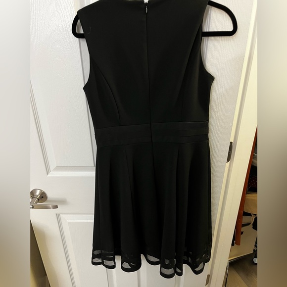 Calvin Klein black dress size 8 with sheer details. - Picture 2 of 5